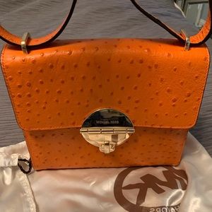 MIchael Kors tangerine ostrich-style leather bag